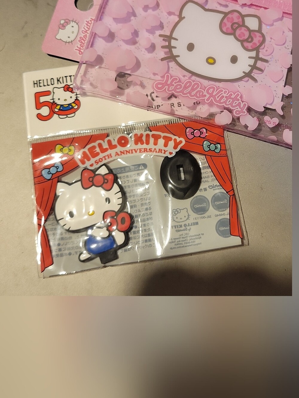 Hello Kitty Pink Clear Case And A 50th Anniv. Display